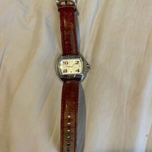 Invicta woman’s watch. Red band